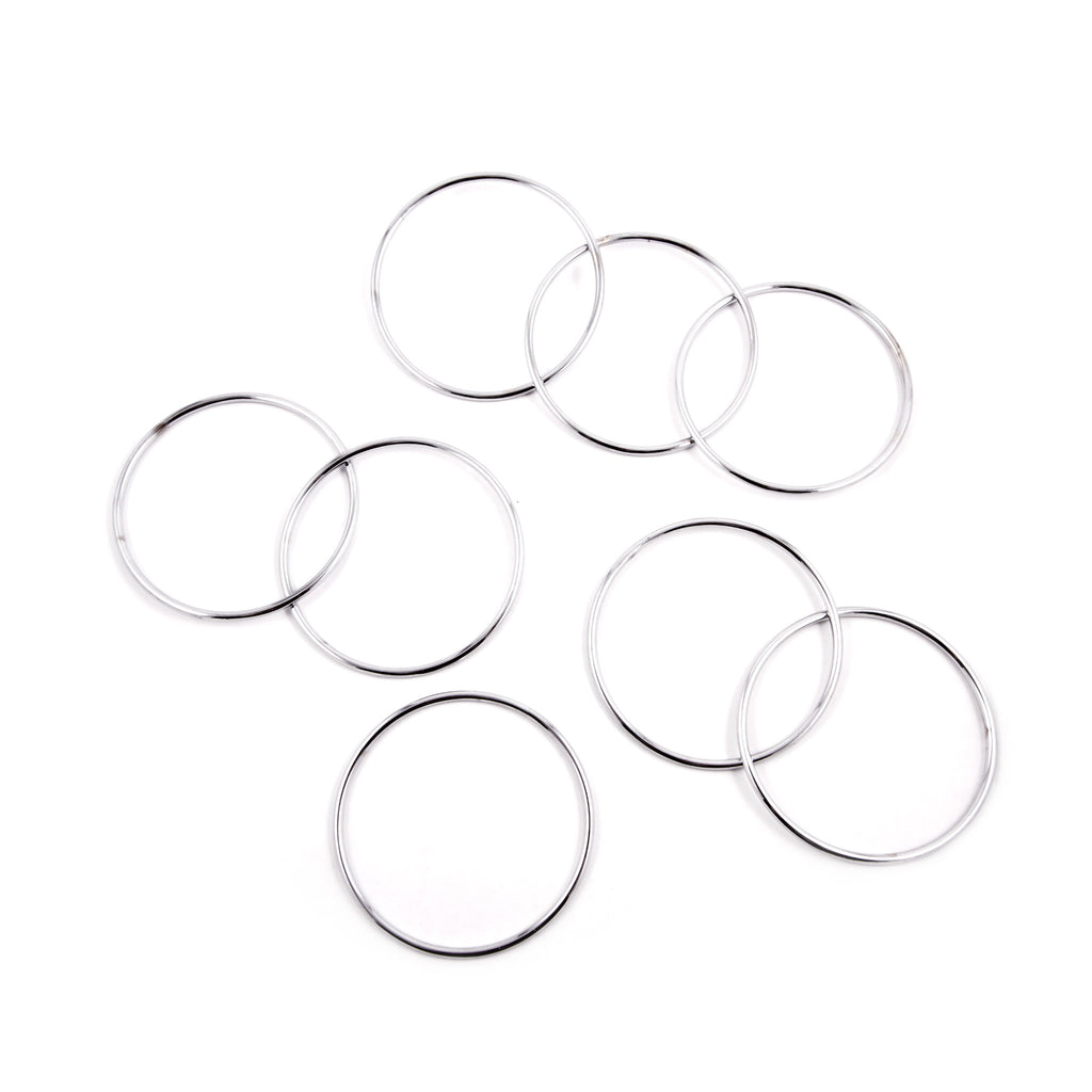 Set of four 4" metal rings. You know what to do. And just in case you don't, these rings come with a handy set of instructions.