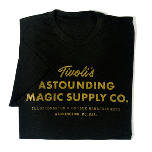 Dark grey shirt with Tivoli's Astounding Magic Supply Co. logo in gold.