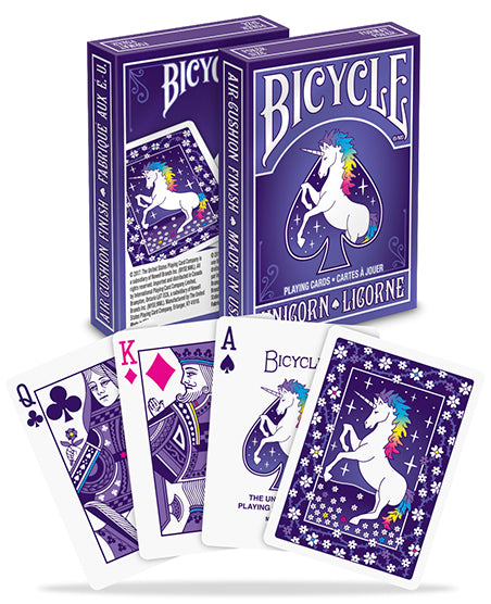 Playing cards' back design features a unicorn against a blueish-purple background resembling night time; flower patterns are scattered throughout. 