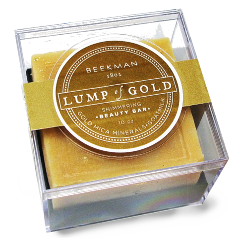 Beekman 1802 Lump of Gold shimmering beauty bar. 10 ounce soap bar made of gold mica minerals and goat milk. Clear box container.