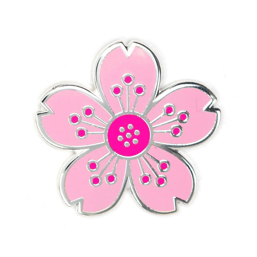 1 inch silver pin shaped in a cherry blossom with five petals.